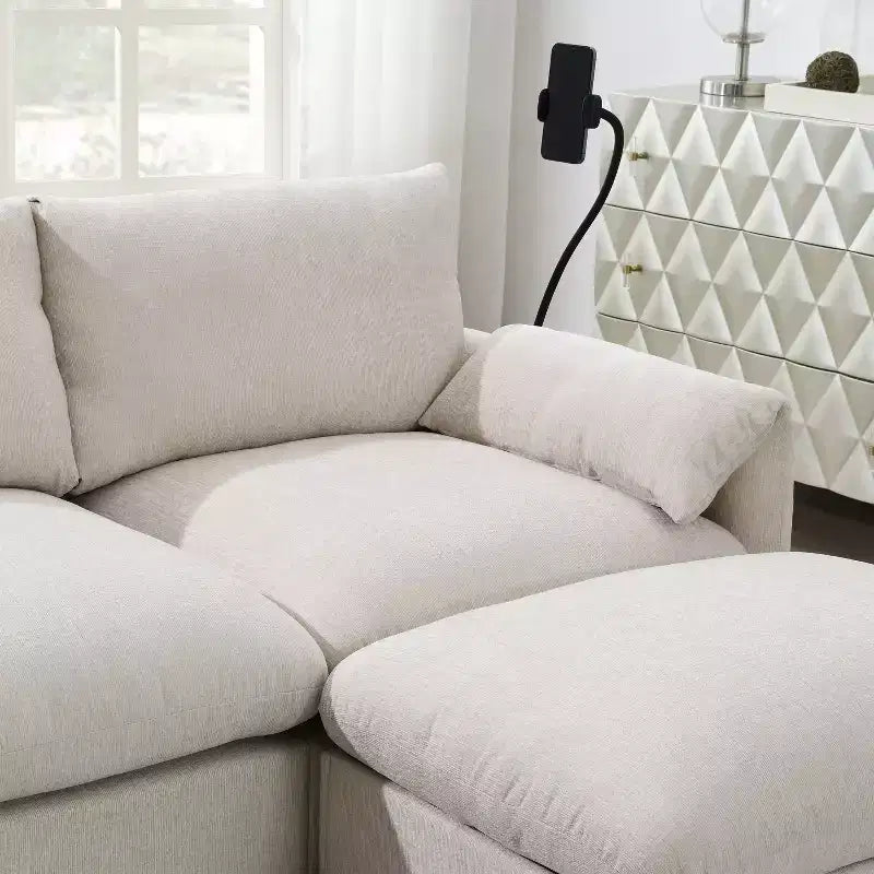 Grand canapé d'angle en chenille avec pouf de rangement et poches, support de téléphone réglable et ports de charge