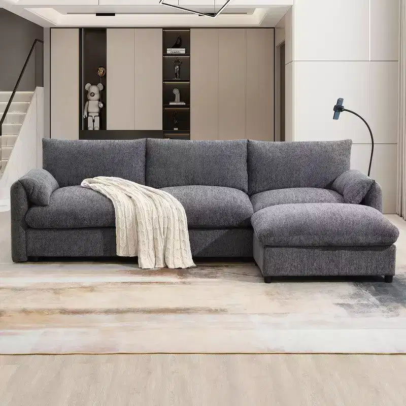 Grand canapé d'angle en chenille avec pouf de rangement et poches, support de téléphone réglable et ports de charge